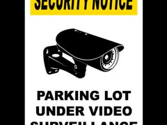 Parking Lot Under Surveillance Sign